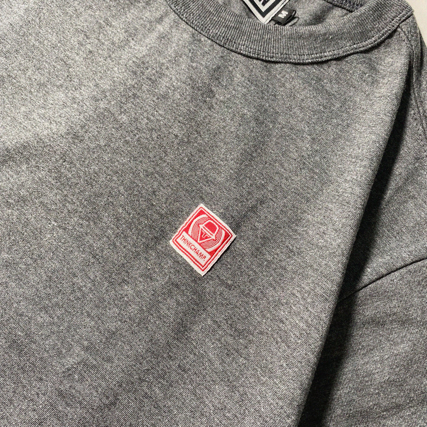 ICONIC PATCH | BOXY TEE IN ACID BLACK