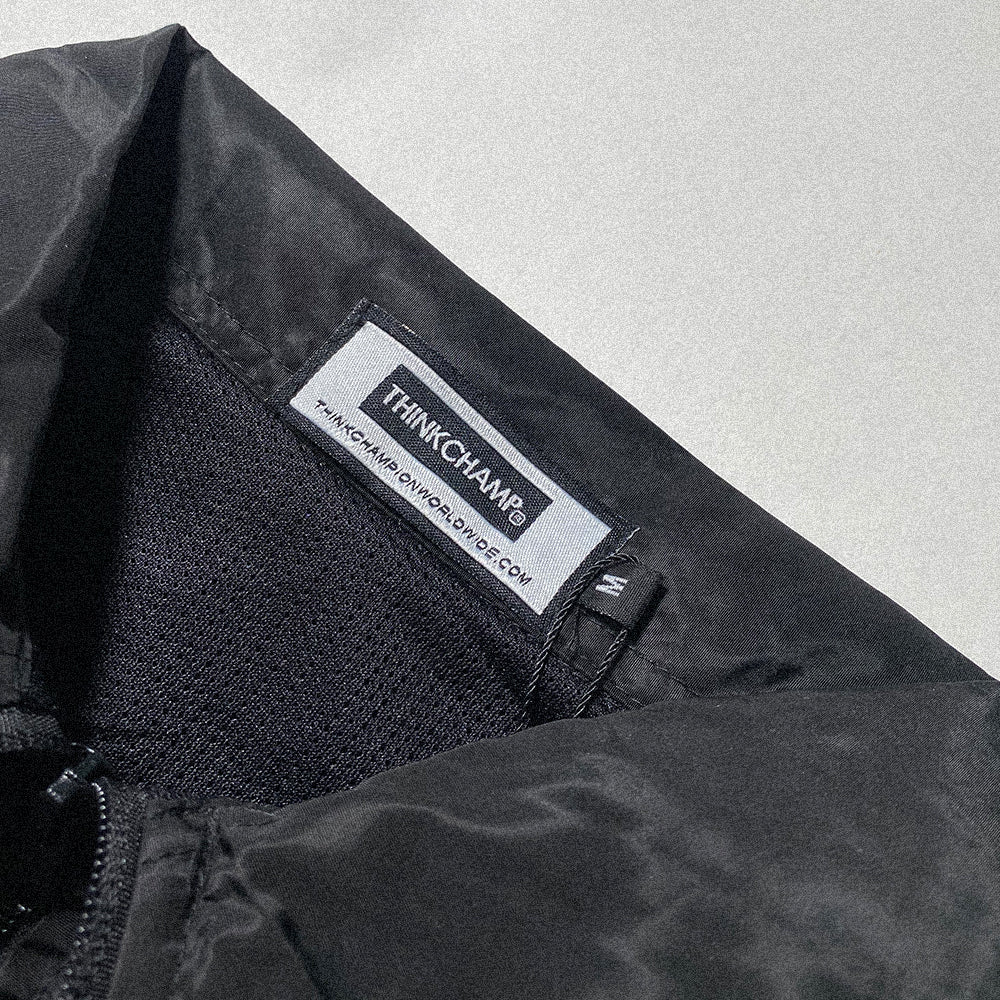 SCRAMBLER | HYBRID TRACK SUIT IN BASALT BLACK