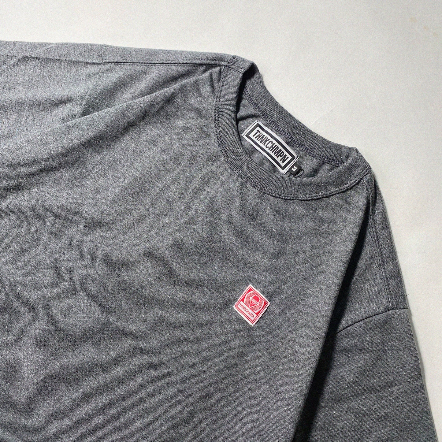 ICONIC PATCH | BOXY TEE IN ACID BLACK