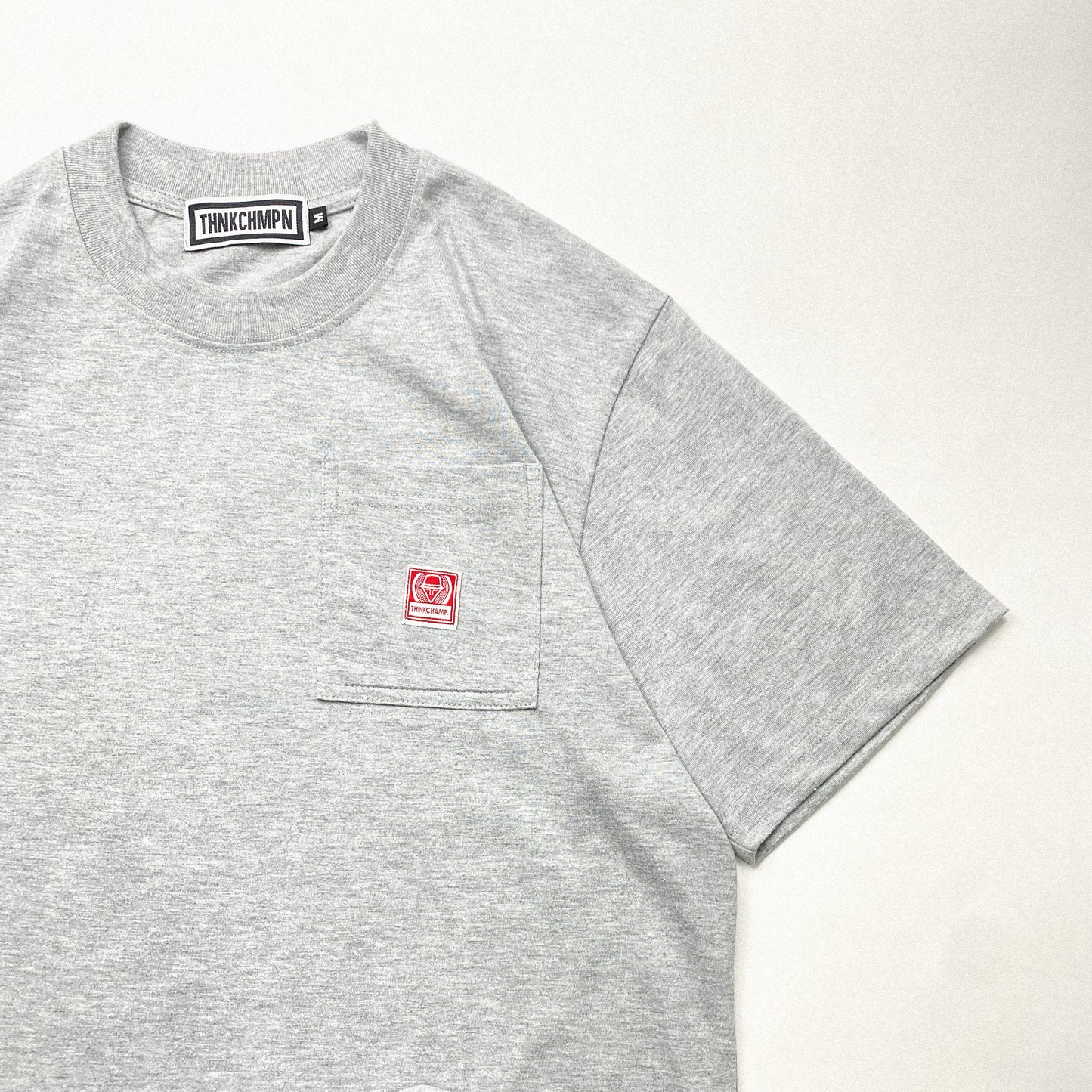 THINK CHAMP | HEATHER GREY | SHORT SLEEVE POCKET TEE