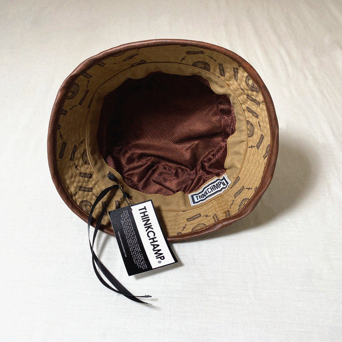 FULL PRINT DENIM BUCKET HAT IN KHAKI