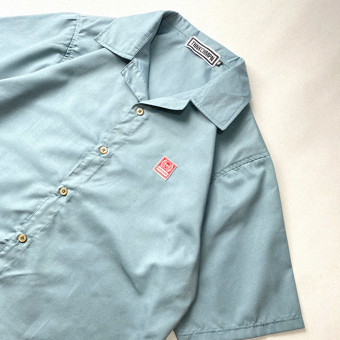 OPEN COLLAR POLO IN POWDER BLUE