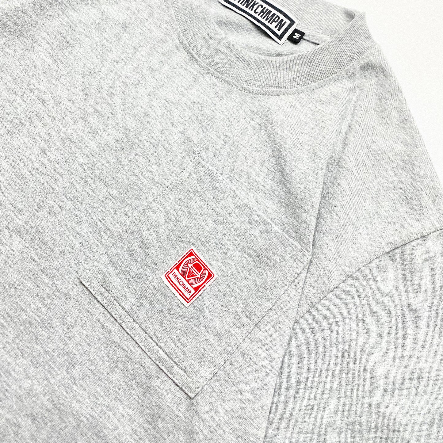 THINK CHAMP | HEATHER GREY | SHORT SLEEVE POCKET TEE