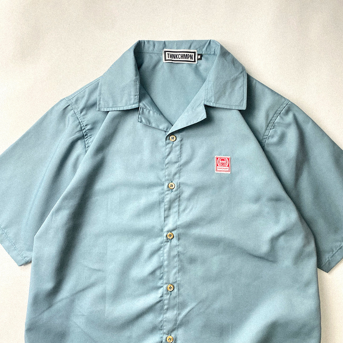 OPEN COLLAR POLO IN POWDER BLUE