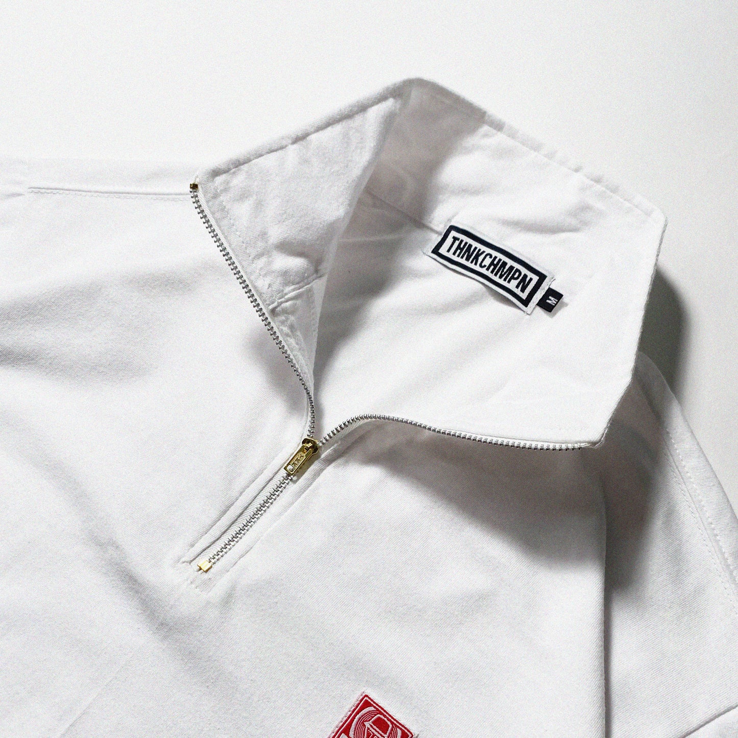 QUARTER ZIP ICONIC PATCH | BOXY FIT IN WHITE