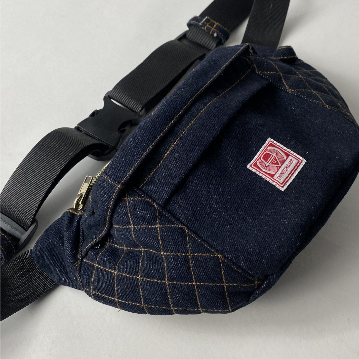 DENIM CARRIER BELT BAG IN INDIGO BLUE