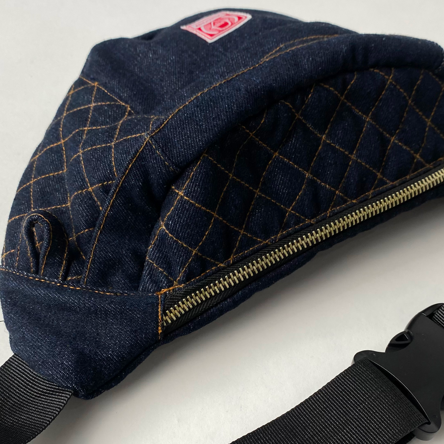 DENIM CARRIER BELT BAG IN INDIGO BLUE