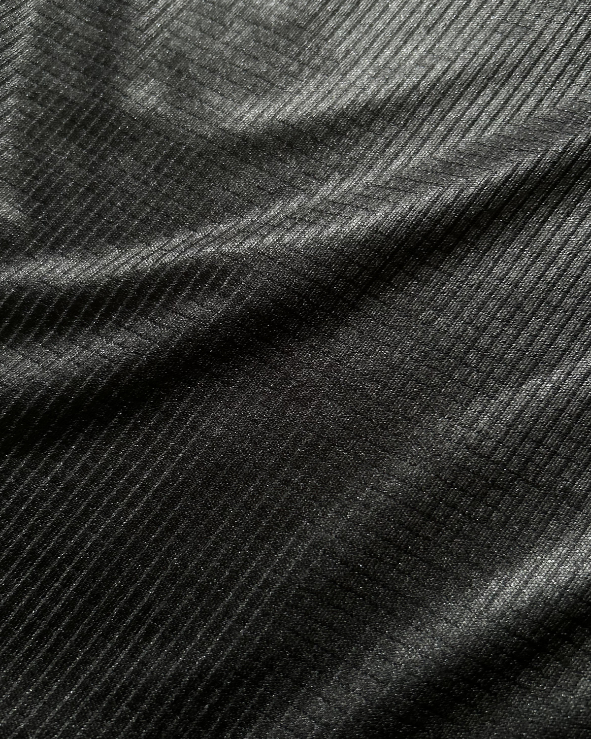 RACE SINGLET IN BASALT BLACK