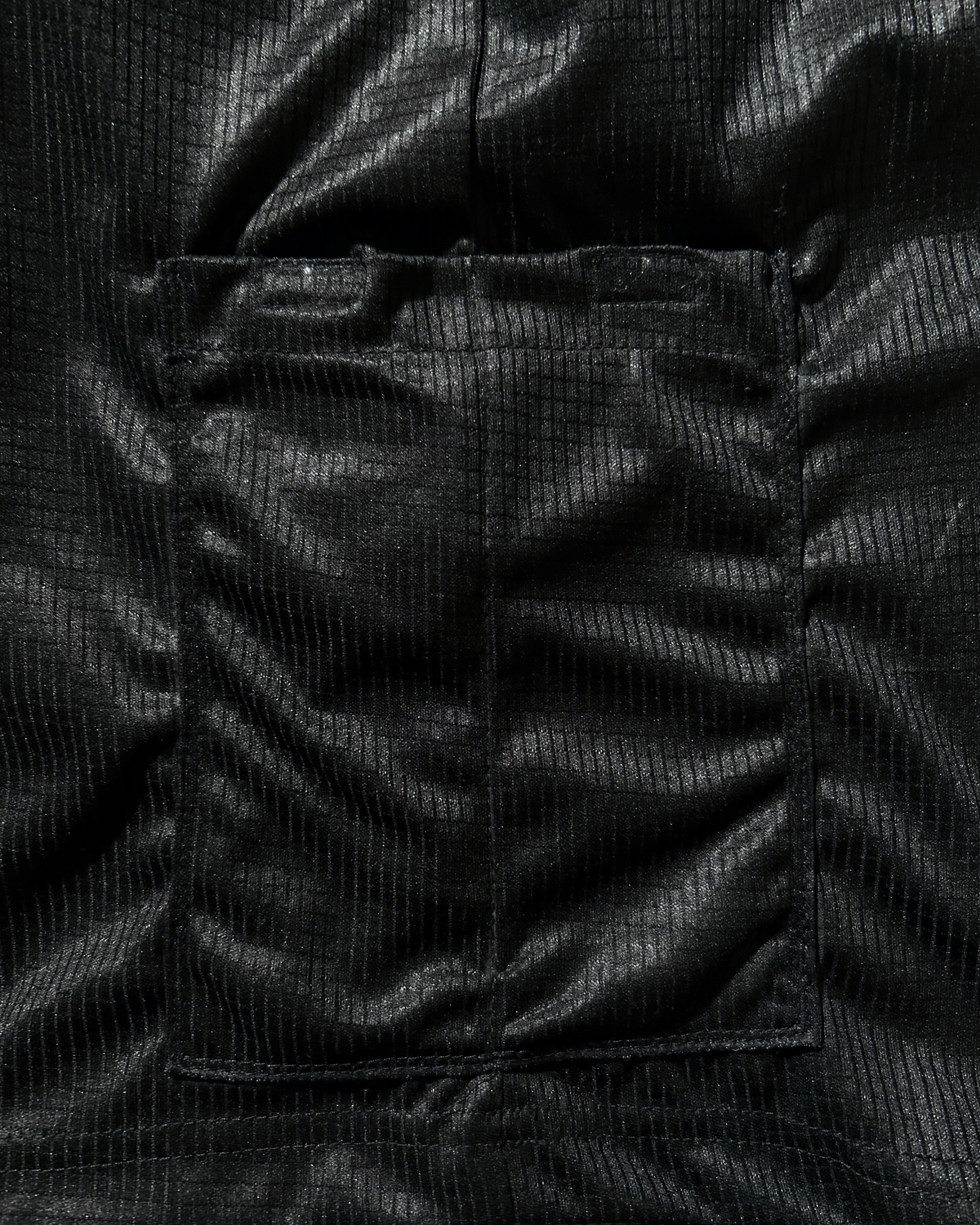 RACE SINGLET IN BASALT BLACK