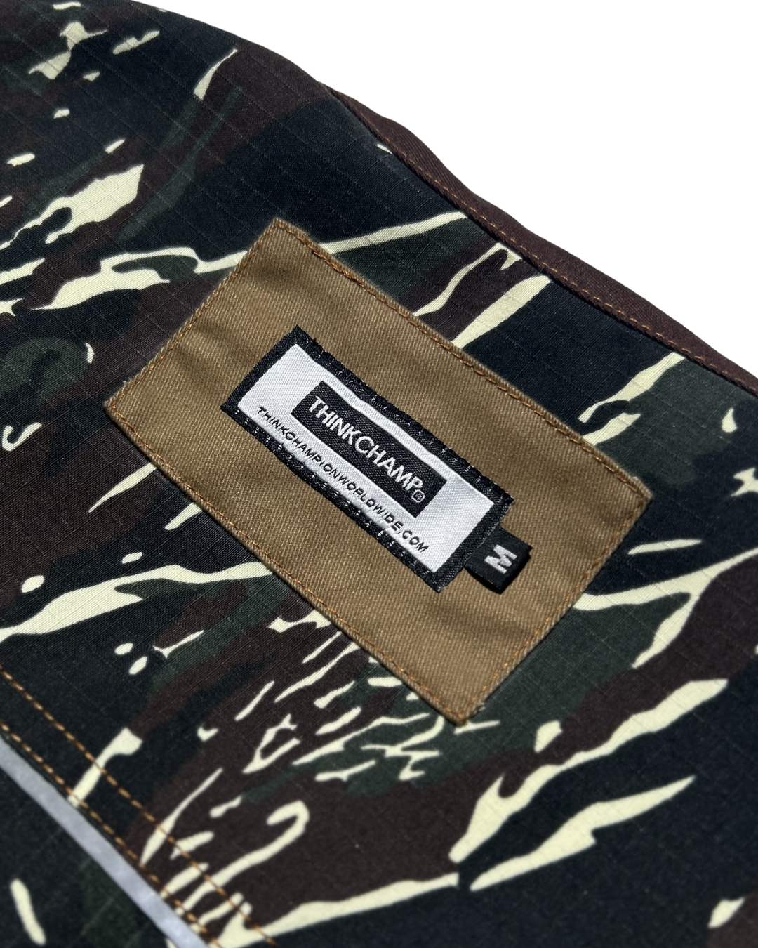 PATHFINDER REVERSIBLE UTILITY VEST IN SAND WHITE AND TIGER CAMOU COLORWAY